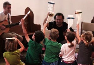 Gerardo Calderon with young musicians at Grace Art Camp.