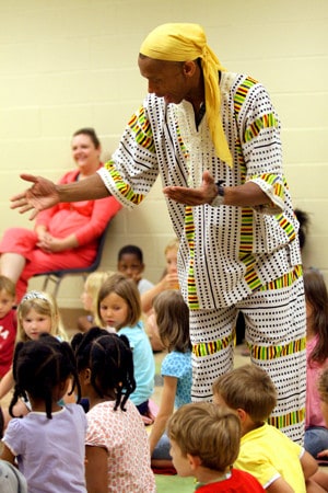 Professional storyteller Chetter Galloway tells tales during the kick off event for the Tuscaloosa Public Library's summer reading program "Make a Splash!" at the Brown Branch Monday, June 7, 2010. (Marion R Walding)